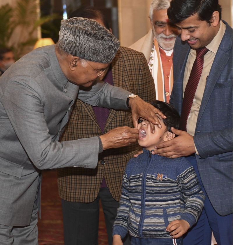 President Ram Nath Kovind launches the first round of Pulse Polio Programme 2021 by administering Polio drops to a child at Rashtrapati Bhavan, in New Delhi on January 30, 2021. (PTI Photo)