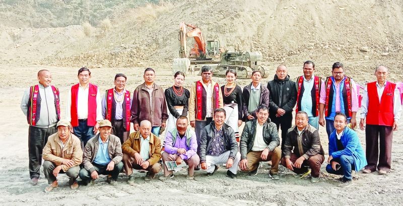 Officials overseeing the construction of a new football ground at Kiruphema.