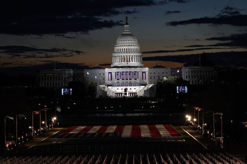 Capitol Building and stage for the swearing-in is lit as events get underway for President-elect Joe Biden's inauguration ceremony on January 20, 2021, in Washington. (AP/PTI Photo)