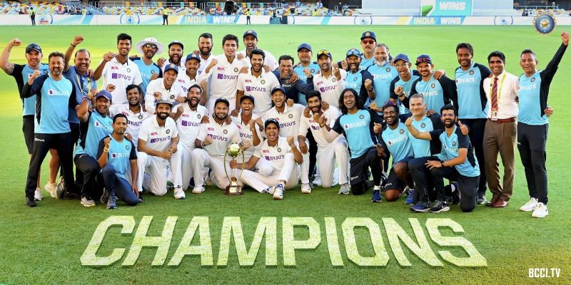 Indian players pose with the winning trophy after defeating Australia by three wickets on the final day of the fourth cricket test match at the Gabba, Brisbane, Australia on January 19, 2021. India won the four test series 2-1. (PTI Photo)