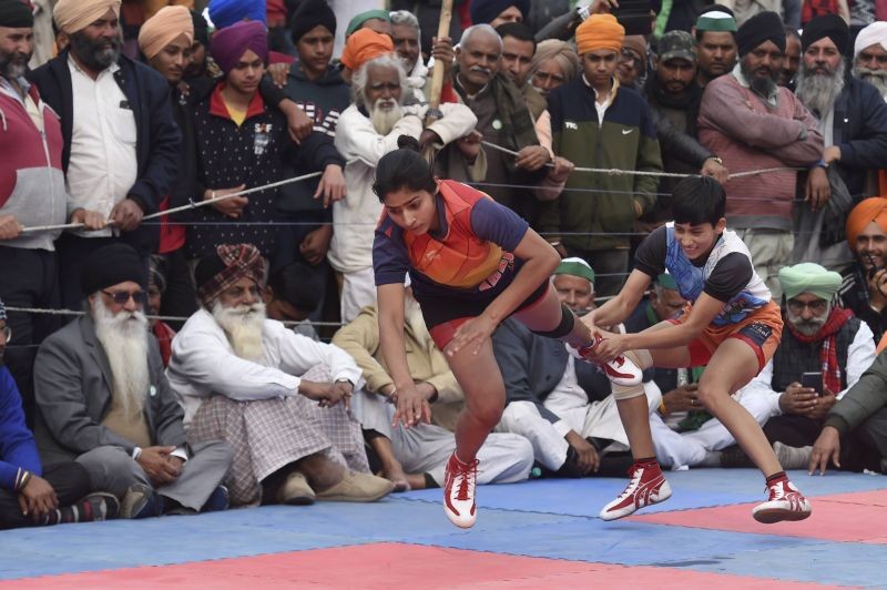 New Delhi: Teams of young women play Kabaddi during the ongoing farmer's protest at Ghazipur Border, in New Delhi, Monday, Jan. 18, 2021. (PTI Photo/Atul Yadav)