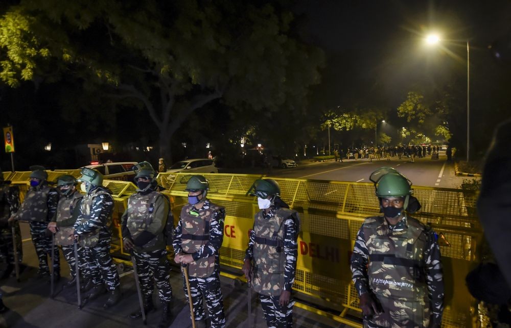 New Delhi: Security personnel stand guard after a minor IED blast outside the Israeli Embassy, in New Delhi, Friday, Jan. 29, 2021. No injuries were reported. (PTI Photo/Kamal Singh)