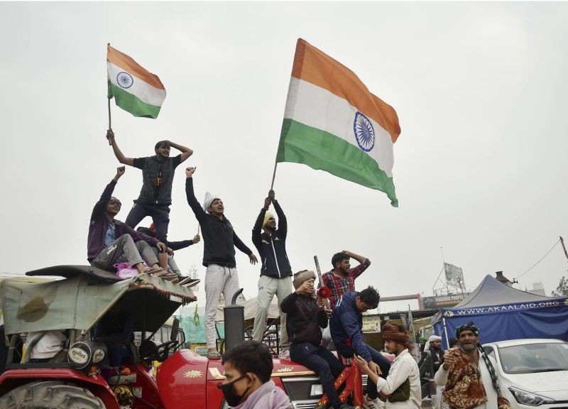 Farmers during their ongoing protest against new farm laws, at Singhu Border in New Delhi on January 18, 2021. (PTI Photo)