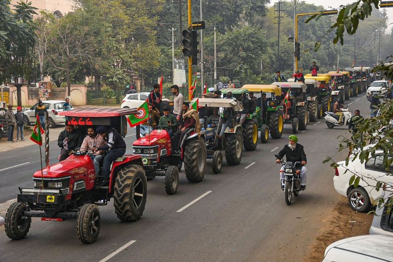 Patiala: Farmers take out a tractor march as part of the preparations for their planned tractor parade in the national capital on Republic day, during a protest against the new farm laws, in Patiala, Friday, Jan. 22, 2021. (PTI Photo)