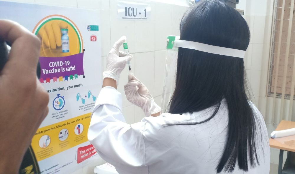 A doctor prepares a dose of Covishield vaccine in Dimapur on January 16, the day when the nationwide COVID-19 vaccination drive was launched in India. (Morung Photo)