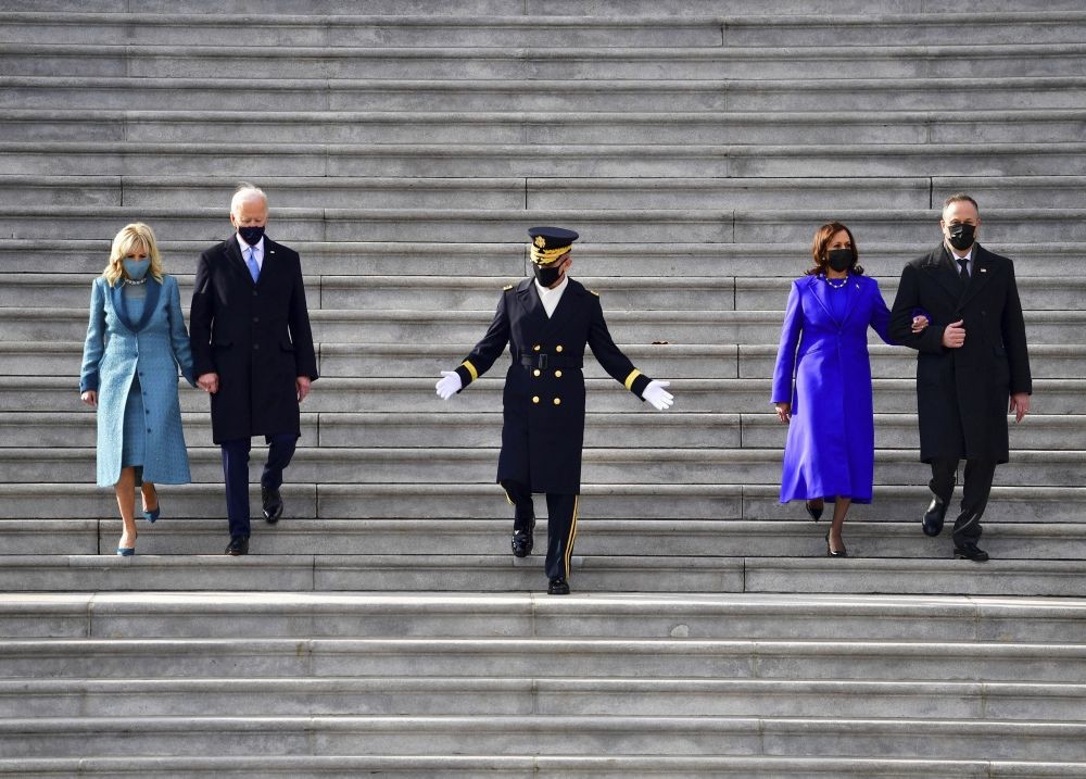 Washington : President Joe Biden, first lady Jill Biden, Vice President Kamala Harris and her husband Douglas Emhoff walk down the steps of the U.S. Capitol after they were sworn into office during the inauguration, Wednesday, Jan. 20, 2021, in Washington. AP/PTI