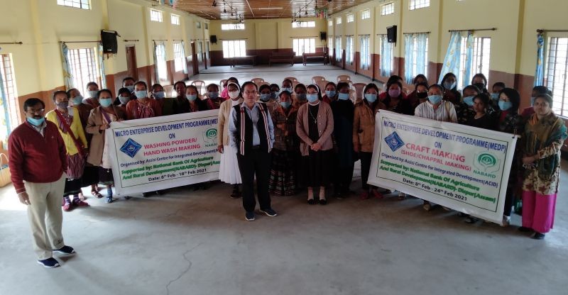 Officials with participants during the launching of the Micro Enterprise Development Programme on shoe/chappal making and detergent making on February 8.