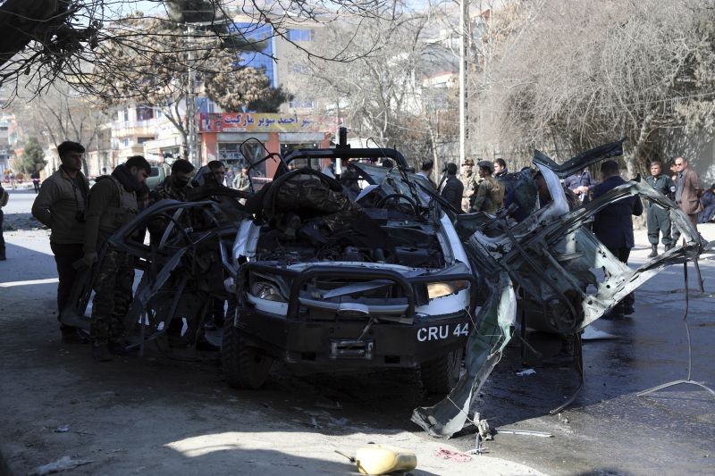 Afghan security personnel inspect the site of a bomb attack in Kabul, Afghanistan on February 6. There were two separate explosions Saturday in Afghanistan capital Kabul, according to Afghan officials.  (AP/PTI Photo)