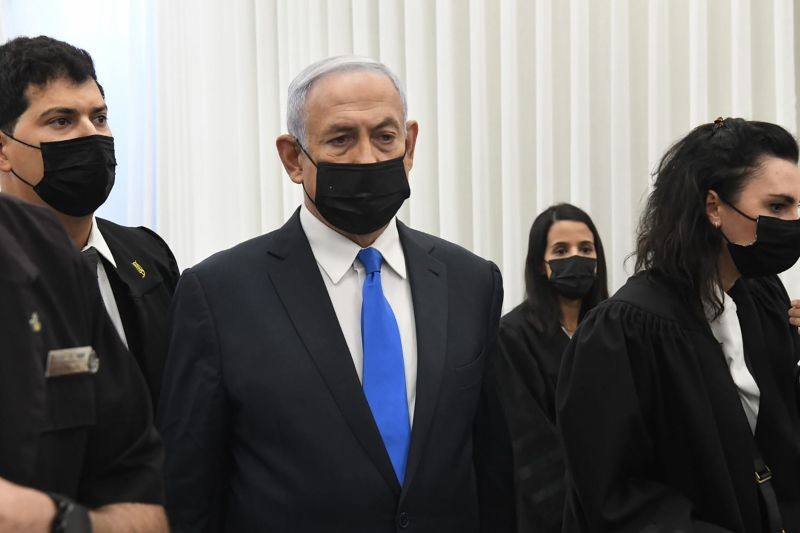 Israeli Prime Minister Benjamin Netanyahu stands at a hearing at the district court in Jerusalem on February 8, 2021. Netanyahu appeared in a Jerusalem courtroom Monday to respond formally to corruption charges just weeks before national elections in which he hopes to extend his 12-year rule. (AP/PTI Photo)