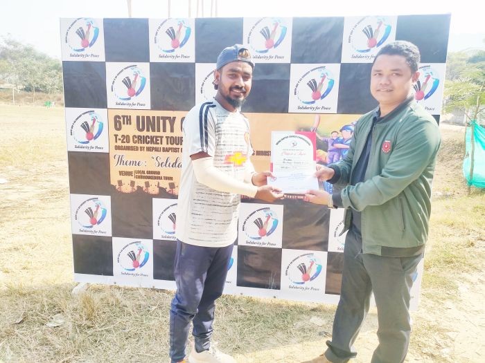 Bishnu of Borlengri Knights CC receiving the man of the match award on February 1.
