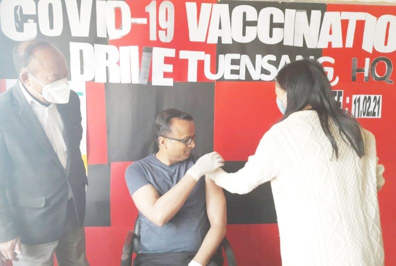 DC Tuensang Kumar Ramnikant receiving the first shot of Covishield vaccine in the DC office during the vaccination drive in Tuensang on February 11. (DIPR Photo)