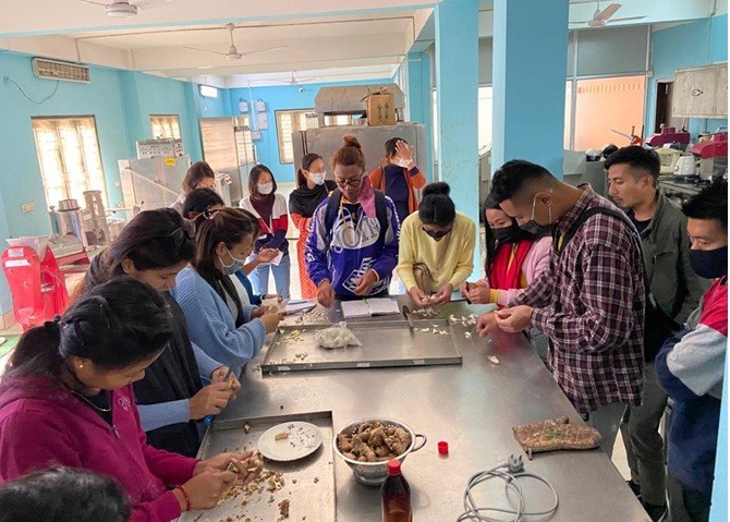 Trainees from Nagaland during the demonstration session in making ginger garlic paste.