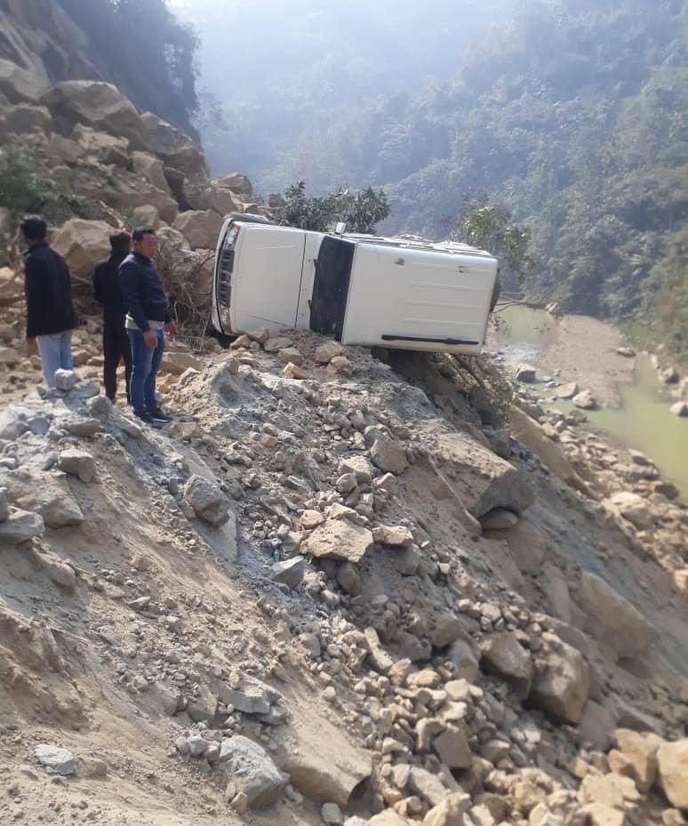 A vehicle damaged during the February 2 morning rockslide in new Chümoukedima segment of NH 29.