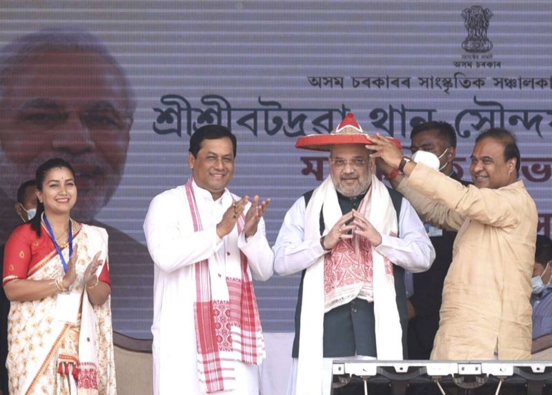 Union Home Minister Amit Shah being felicitated by Assam Chief Minister Sarbananda Sonowal and Assam Finance Minister Himanta Biswa Sharma during a public rally, at Batadrava in Nagaon district on February 25, 2021. (PTI Photo)