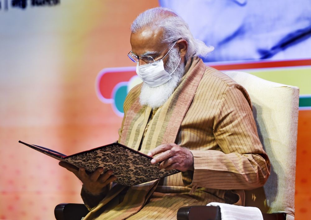 New Delhi: Prime Minister Narendra Modi inaugurates a meeting of the BJP national office bearers at the NDMC convention centre in New Delhi, Sunday, Feb. 21, 2021. (PTI Photo/Shahbaz Khan)