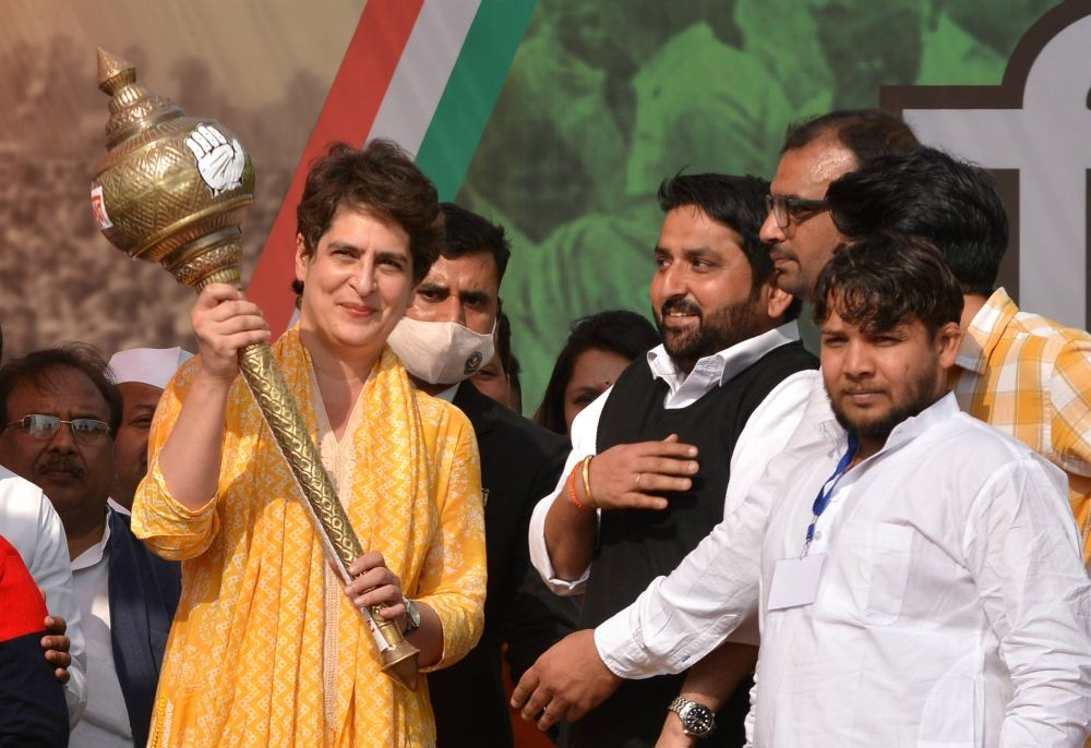 Muzaffarnagar: AICC General Secretary Priyanka Gandhi Vadra being felicitated during a 'Kisan Mahapanchayat', in support of the ongoing farmers' agitation against the three agri-laws, at Baghra in Muzaffarnagar, Saturday, Feb. 20, 2021. (PTI Photo)(