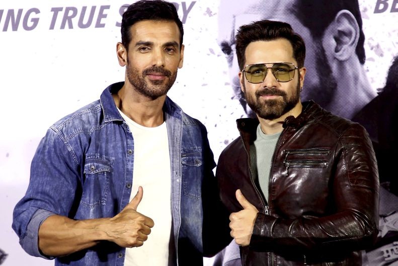 Mumbai: Bollywood actors John Abraham (L) and Emraan Hashmi pose for photographs during the trailer launch of their upcoming film 'Mumbai Saga', in Mumbai, Friday, Feb. 26, 2021. (PTI Photo)