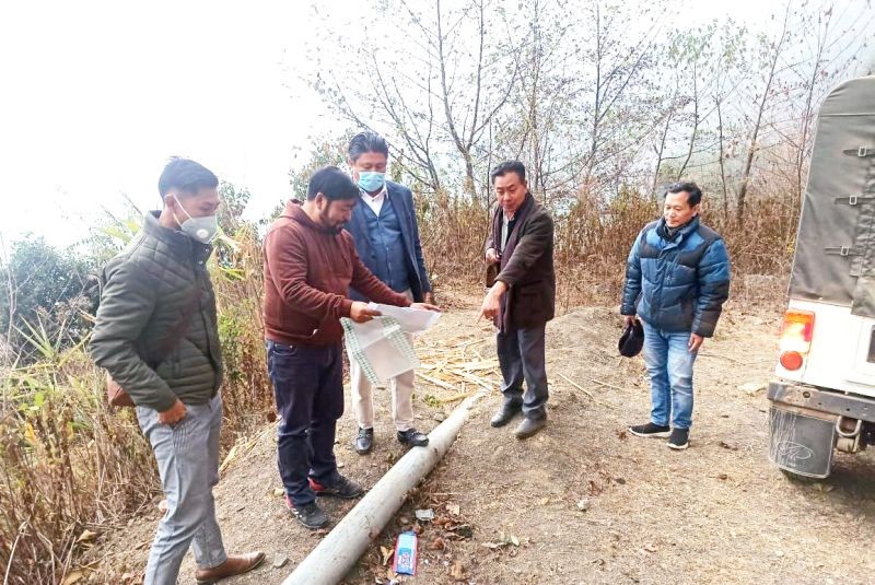 Minister Jacob Zhimomi with officials during their visit to Melahumi and Shevishe village in Tokiye RD Block, under Aghunato sub-division on February 27.