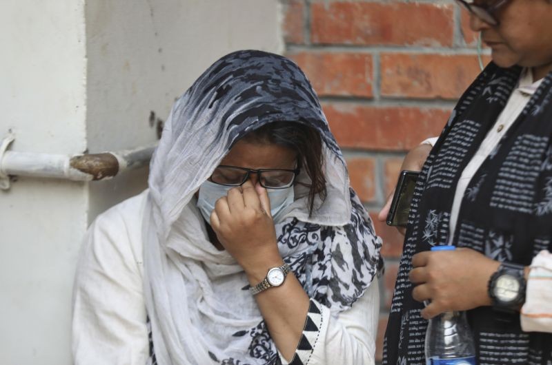 Razia Rahman, wife of Faisal Arefin Deepan, breaks down after hearing the court verdict on the killing of her husband in Dhaka, Bangladesh on February10, 2021 . A special tribunal in Bangladesh's capital on Wednesday sentenced to death eight Islamic militants tied to a banned group for the 2015 killing of Deepan, a publisher of books on secularism and atheism. (AP/PTI Photo)