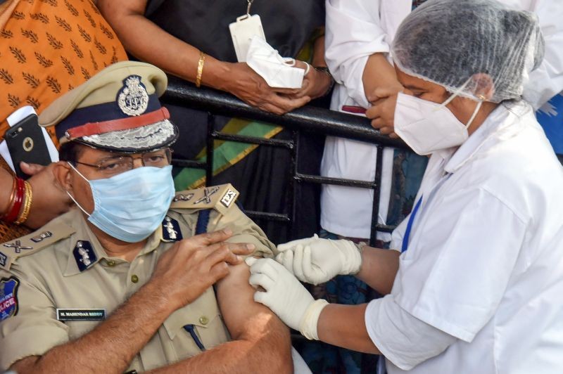 Hyderabad: Telangana DGP M. Mahender Reddy being administered COVID-19 vaccine, in Hyderabad, Saturday, Feb. 6, 2021. (PTI Photo)