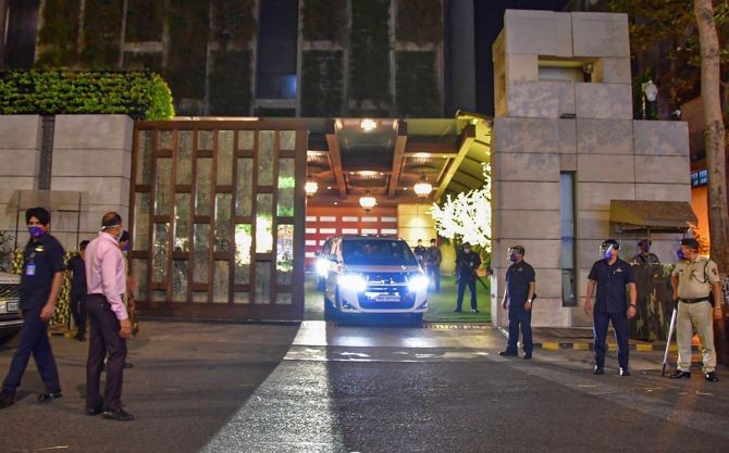 Police personnel guard outside industrialist Mukesh Ambani's residence Antilla after explosives were found in an abandoned car in its vicinity, in Mumbai. Photograph: PTI Photo