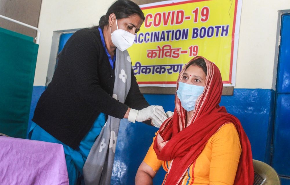 Gurugram: A medic administers the second dose of Covishield vaccine to a frontline worker, in Gurugram, Monday, Feb. 15, 2021. (PTI Photo)