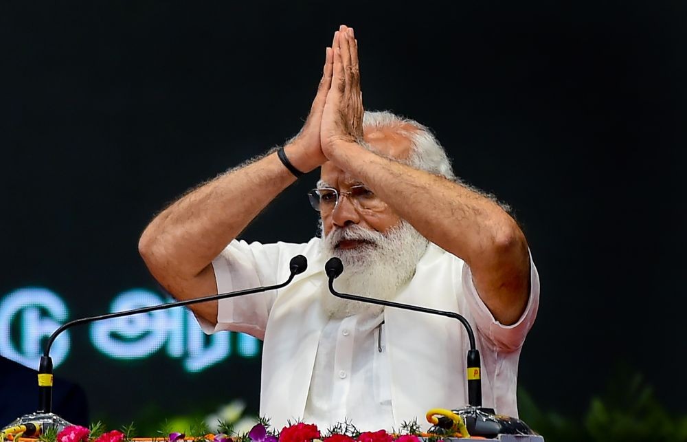Chennai: Prime Minister Narendra Modi greets the gathering during the inauguration of Chennai Metro Rail Phase-I extension, that will link North Chennai with the Airport and Central Railway Station, in Chennai, Sunday, Feb. 14, 2021. (PTI Photo/R Senthil Kumar)