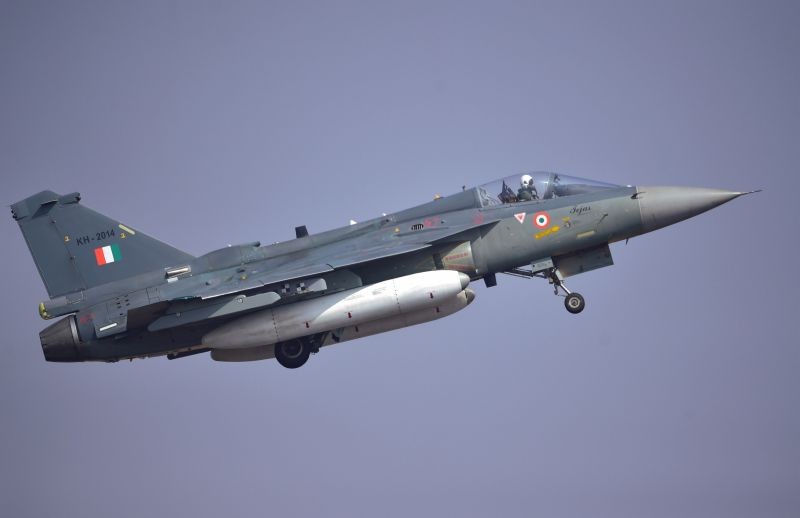 Bengaluru: Indian Air Force's Tejas aircraft performs during rehearsals for the Aero  India 2021, at the Yelahanka air base in Bengaluru, Tuesday, Feb.2, 2021. (PTI Photo/Shailendra Bhojak)
