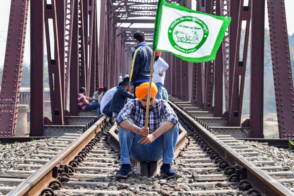 Ambala: Protesting farmers block railway tracks  as part of the nationwide 'Rail Roko Andolan, at  Shahpur in Ambala, Thursday, Feb. 18, 2021. (PTI Photo)