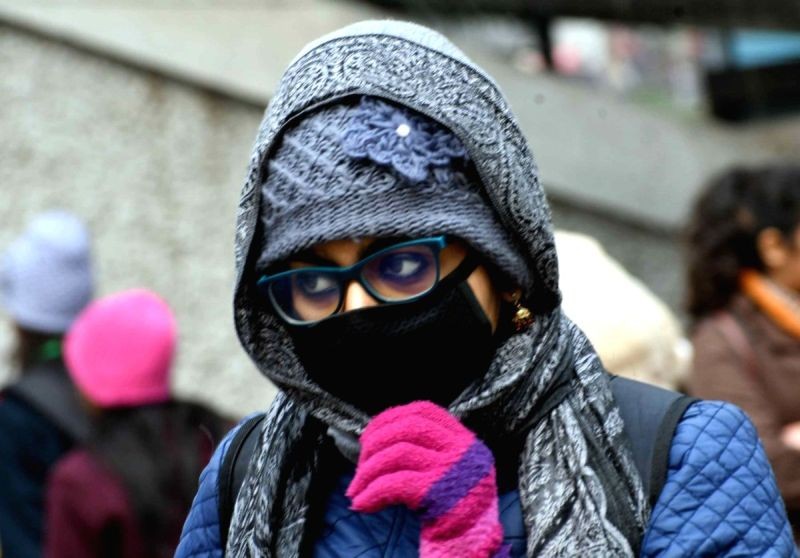 Woman wearing mask. (IANS File Photo)