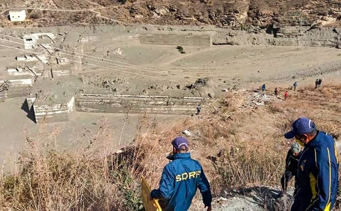 Damaged dam of the Rishi Ganga Power Project, after a glacier broke off in Joshimath in Uttarakhand’s Chamoli district causing a massive flood in the Dhauli Ganga river, on Sunday. Photograph: PTI Photo