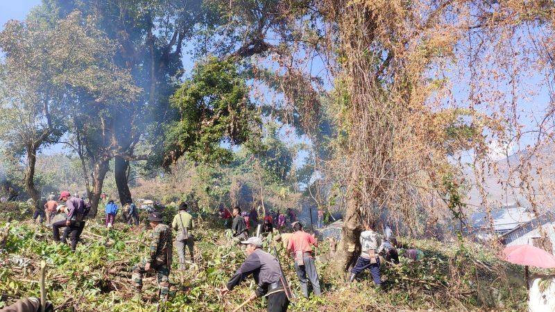 Volunteers take part in the mass social work to clean and beautify the two graveyards of Pathso Nokeng village on February 1 and 8. (Photo Courtesy: PNSU)