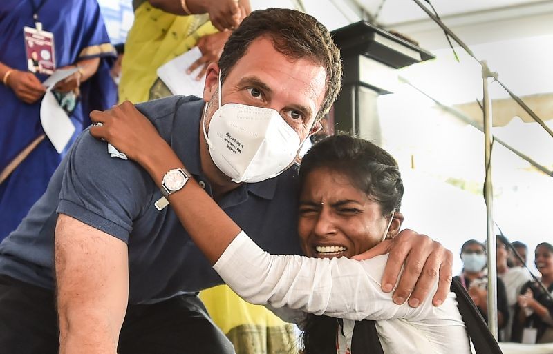 Congress leader Rahul Gandhi poses for photographs with a student during his visit to Bharathidasan Government College for Women, in Puducherry on Wednesday, February 17, 2021. (PTI Photo)