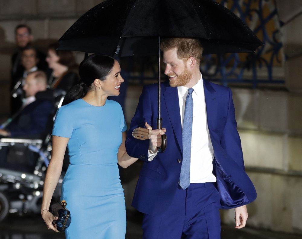 London : FILE - Britain's Prince Harry and Meghan arrive at the annual Endeavour Fund Awards in London, Thursday, March 5, 2020. The Duke and Duchess of Sussex are expecting their second child, their office confirmed Sunday, Feb. 14, 2021. AP/PTI