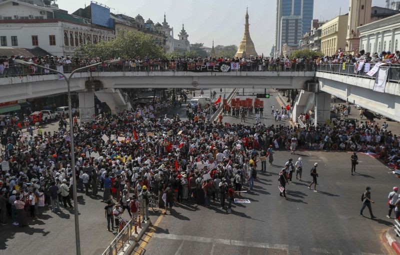 Demonstrators gather close to Sule Pagoda to protest against the military coup in Yangon, Myanmar on February 17, 2021. The U.N. expert on human rights in Myanmar warned of the prospect for major violence as demonstrators gather again Wednesday to protest the military's seizure of power. (AP/PTI Photo)