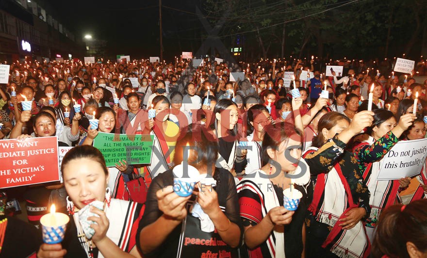 People gathered at the candle light vigil held today at Super Market, Dimapur in honour of the three people who lost their lives in Peren on March 22. (Morung Photo by Soreishim Mahong)        