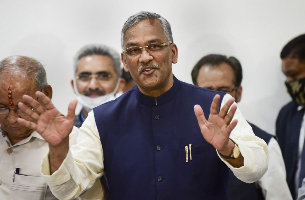 Uttarakhand Chief Minister Trivendra Singh Rawat addresses a press conference after tendering his resignation formally to Governor Baby Rani Maurya, in Dehradun, on Tuesday. Photograph: PTI Photo