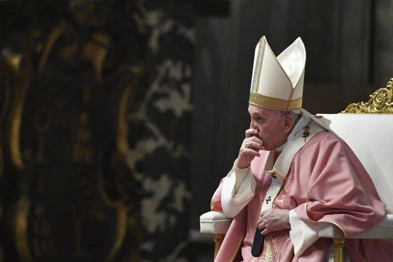 Pope Francis celebrates mass on the occasion of 500 years of Christianity in the Philippines, in St. Peter's Basilica, at the Vatican on March 14, 2021. (AP Photo)