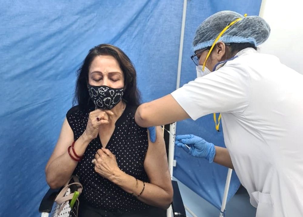  Mumbai: Bollywood actress Hema Malini receives the first dose of COVID-19 vaccine, at Cooper Hospital in Mumbai. (PTI Photo)