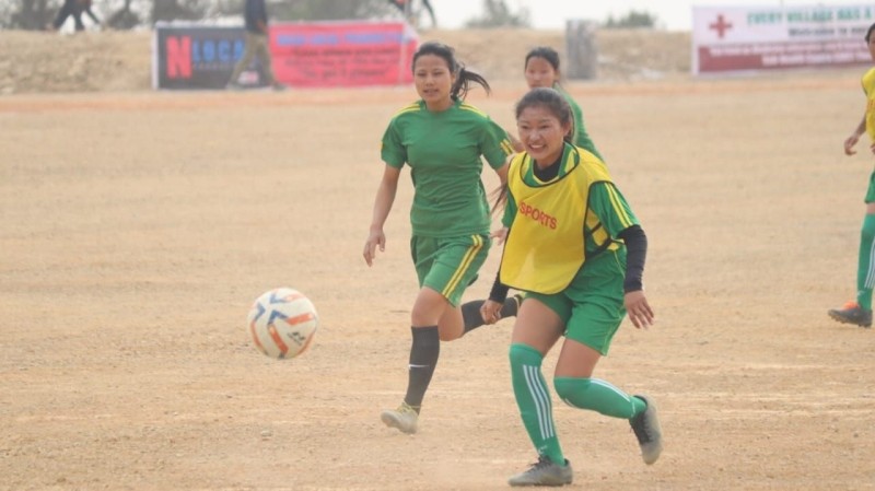 Women‘s football match in progress on the second day of the 36th Phek District Sports Association (PDSA) Meet in Thenyizu village on March 24. (Morung Photo)