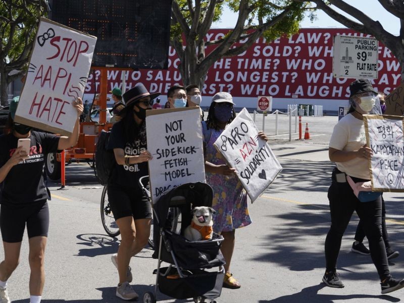 Los Angeles: Demonstrators walk across the Edward Roybal Federal Building at a rally against Asian hate crimes, Saturday, March 27, 2021 downtown Los Angeles. The gathered crowd demanded justice for the victims of the Atlanta spa shooting and for an end to racism, xenophobia and misogyny. AP/PTI