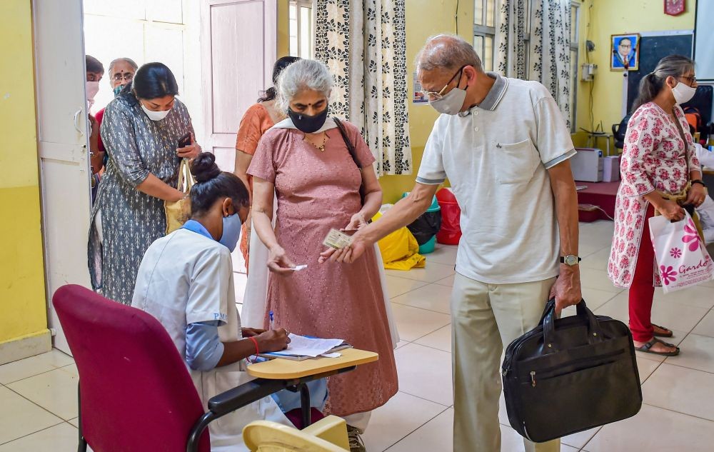 Bengaluru: An elderly couple arrives to take the COVID-19 vaccine, during the second phase of the countrywide inoculation drive in Bengaluru, Saturday, March 6, 2021. (PTI Photo/Shailendra Bhojak)