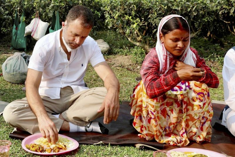 Dibrugarh: Congress Party leader Rahul Gandhi eats lunch with tea garden workers at Chuba tea estate, ahead of the state assembly polls, in Dibrugarh district, Friday, March 19, 2021. (PTI Photo) 