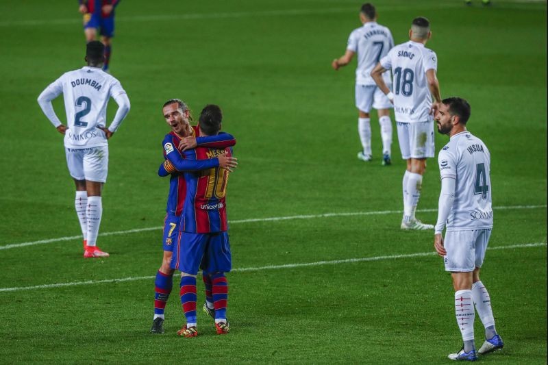 Barcelona: Barcelona's Antoine Griezmann, center left, celebrates after scoring his side's second goal during the Spanish La Liga soccer match between FC Barcelona and Huesca at the Camp Nou stadium in Barcelona, Spain, Monday, March 15, 2021. AP/PTI