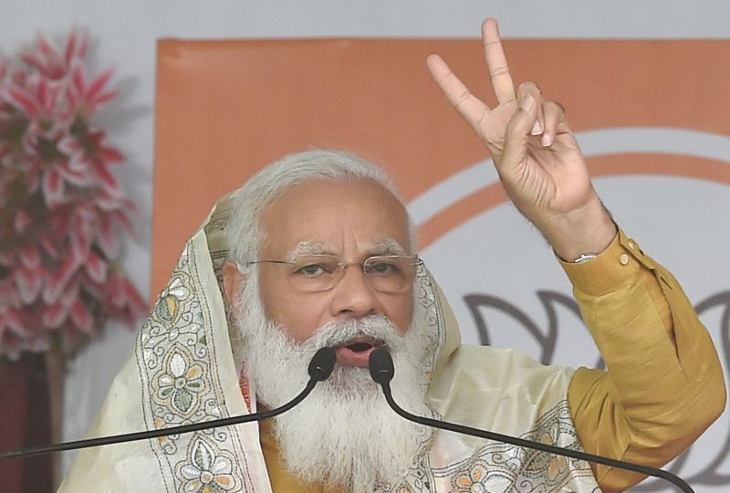 Prime Minister Narendra Modi addresses during an election campaign rally, ahead of West Bengal assembly polls, at Kanthi in East Midnapore district on March 24. (PTI Photo)