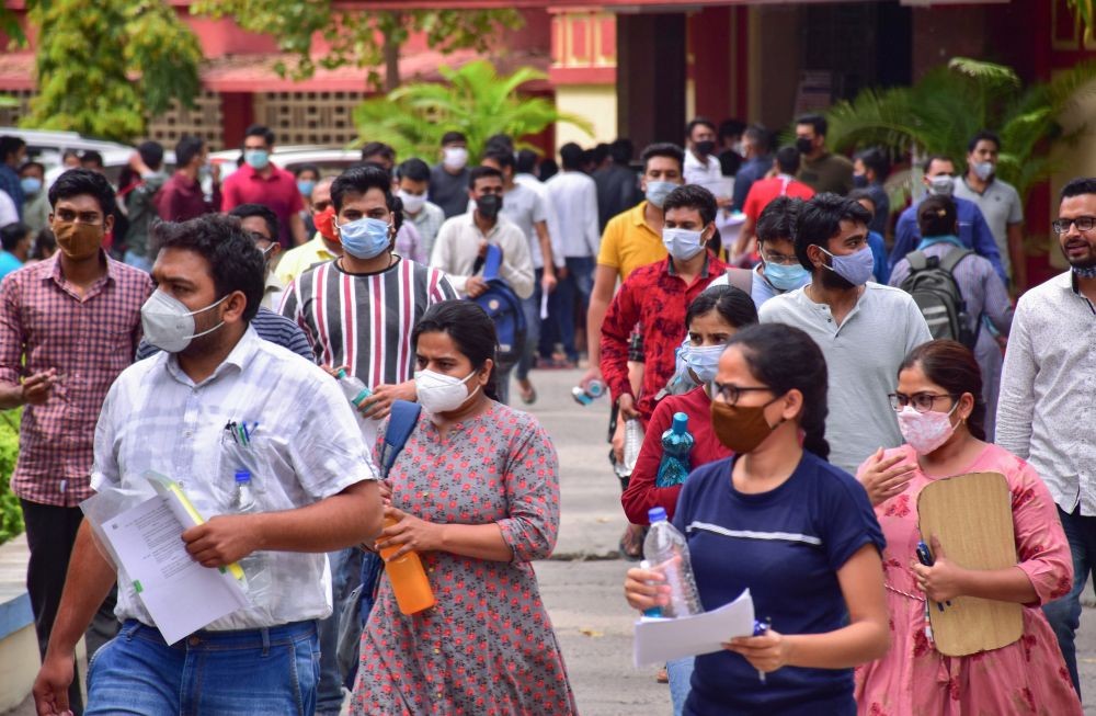 Jabalpur: Aspirants leave an examination centre after appearing in Madhya Pradesh Public Service Commission (MPPSC) exams, amid the ongoing coronavirus pandemic, in Jabalpur, Monday, March 22, 2021. (PTI Photo)