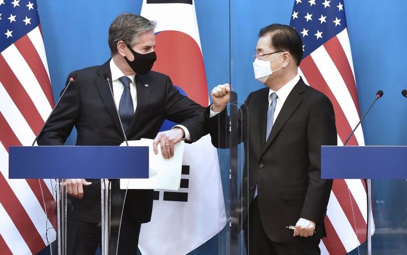 U.S. Secretary of State Antony Blinken, left, bumps elbows with South Korean Foreign Minister Chung Eui-yong after a joint press conference at the Foreign Ministry in Seoul, South Korea on March 18, 2021. (AP/PTI Photo)