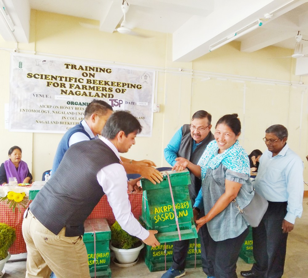 Beekeepers receiving scientific bee boxes for taking up scientific beekeeping during the training programme held on March 14. (Photo Courtesy: SASRD NU)