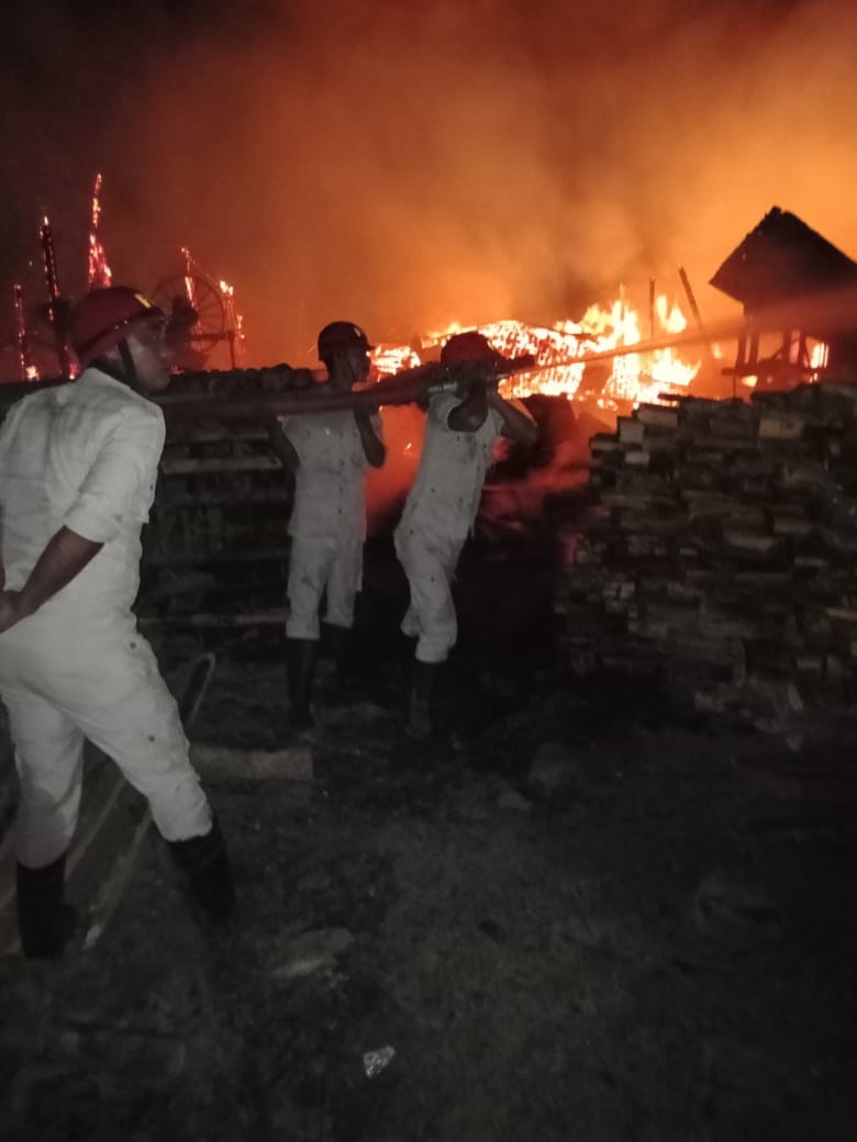 Fire personnel at the fire incident site at 7th Mile, near Ashok Leyland showroom, Dimapur on March 17.