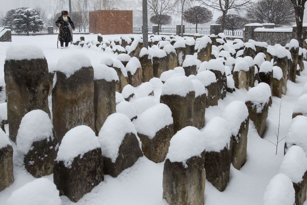 Grozny: An elderly Chechen man walks to pray at a snow-covered cemetery, a memorial to the Stalin-era deportation's victims, in Grozny, Russia, Friday, March 12, 2021. Chechens and Ingush were victims of the 1944 deportations to the barren steppes of then-Soviet Central Asia. AP/PTI
